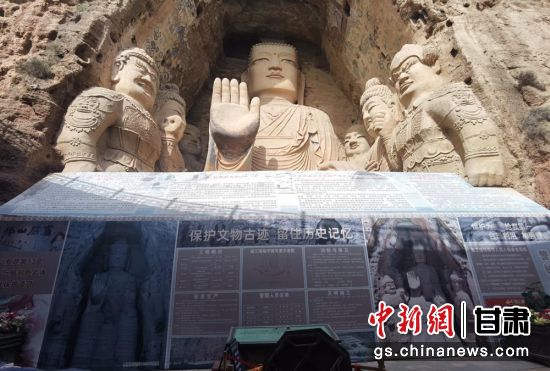 時(shí)下，中國(guó)“石窟鼻祖”天梯山石窟第13窟大佛足部與局部危巖體搶救性保護(hù)項(xiàng)目正在施工。圖為施工現(xiàn)場(chǎng)。陳曉斌 攝