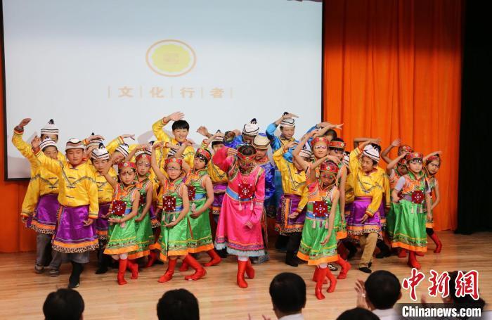 圖為蘭州大學(xué)文化行者團(tuán)隊(duì)走進(jìn)民族社區(qū)，開展系列活動(dòng)。(資料圖)蘭州大學(xué)供圖