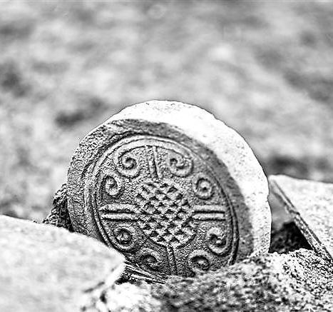 禮縣四角坪遺址出土的云紋瓦當